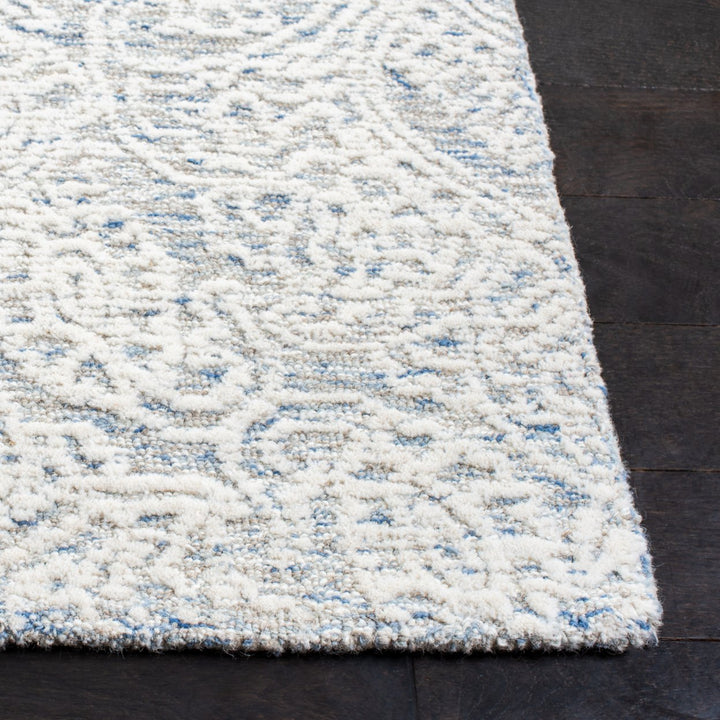 SAFAVIEH Metro MET998L Handmade Light Blue / Ivory Rug Image 10