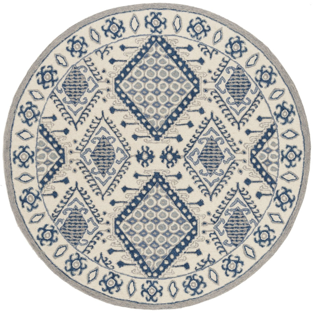 SAFAVIEH Micro-Loop MLP511M Handmade Ivory / Blue Rug Image 1