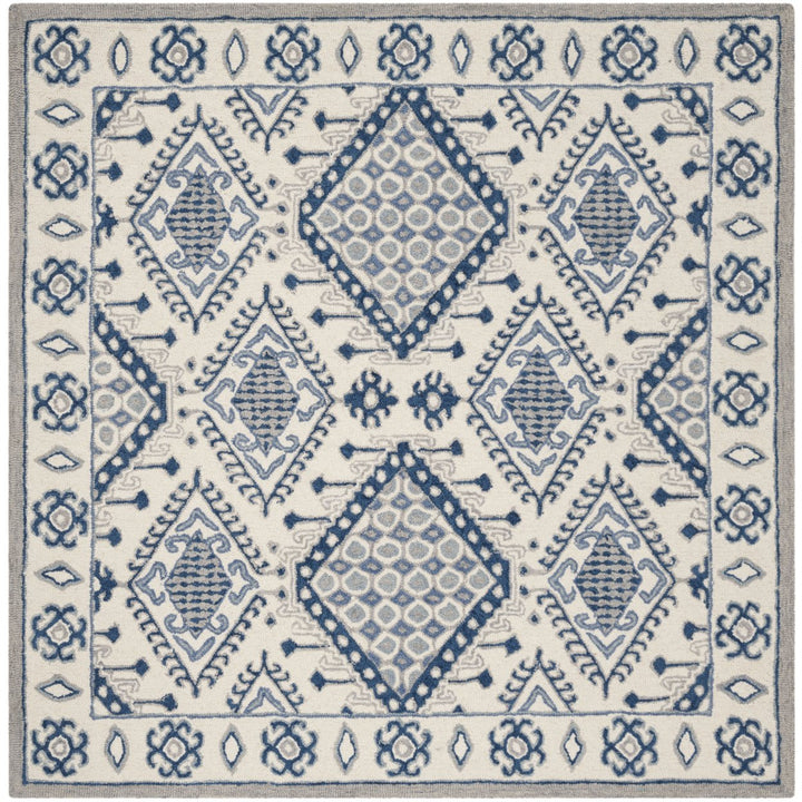 SAFAVIEH Micro-Loop MLP511M Handmade Ivory / Blue Rug Image 1