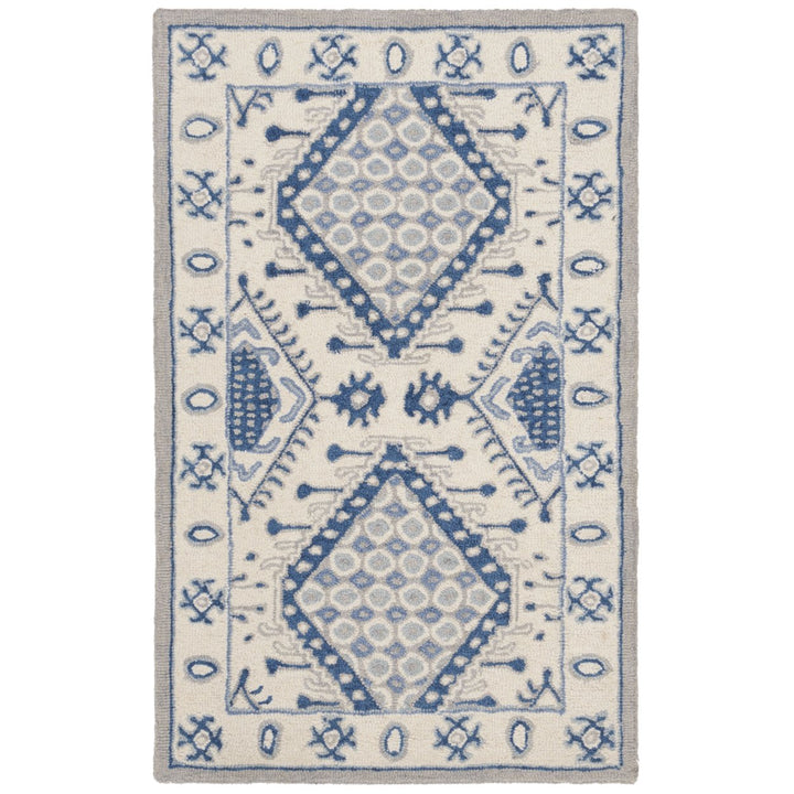 SAFAVIEH Micro-Loop MLP511M Handmade Ivory / Blue Rug Image 1