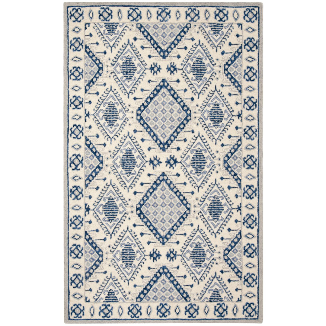 SAFAVIEH Micro-Loop MLP511M Handmade Ivory / Blue Rug Image 1