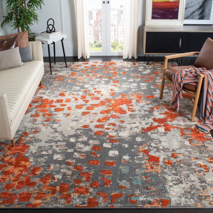 SAFAVIEH Monaco Collection MNC225H Grey / Orange Rug Image 1