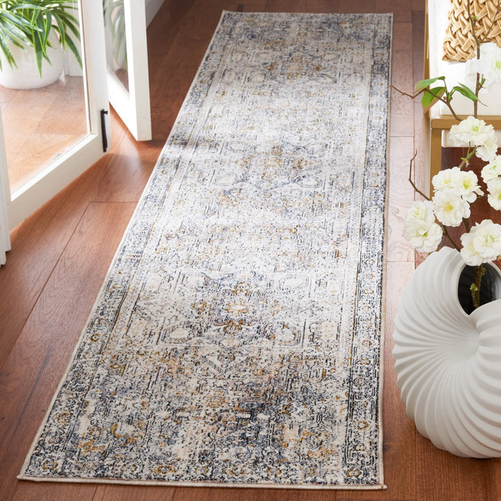 SAFAVIEH Moondust Collection MND652A Ivory / Blue Rug Image 3