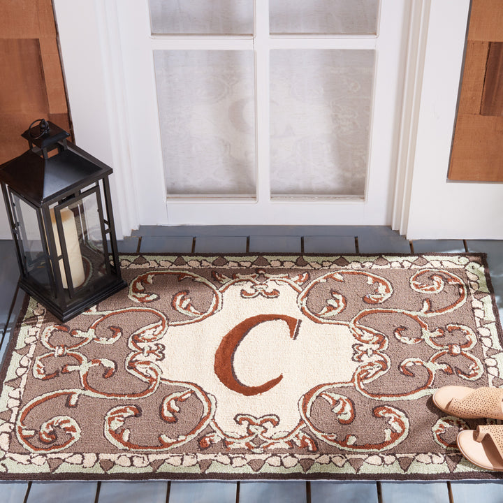 SAFAVIEH Monogram Collection MON214C Mocha Rug Image 1