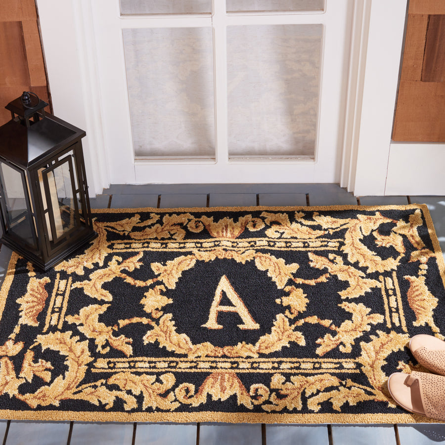 SAFAVIEH Monogram Collection MON219A Hand-hooked Black Rug Image 1