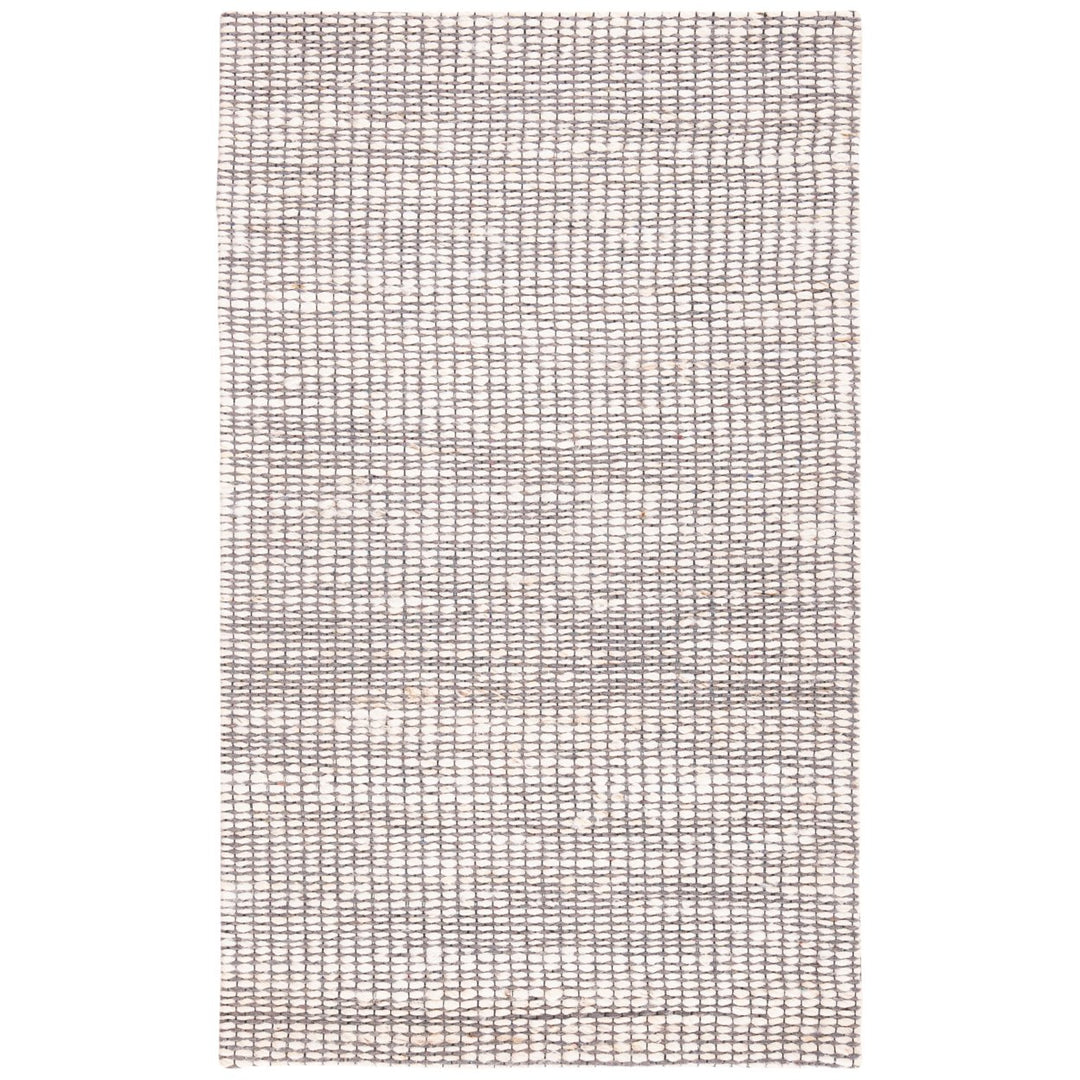 SAFAVIEH Marbella Collection MRB303A Braided Ivory Rug Image 1