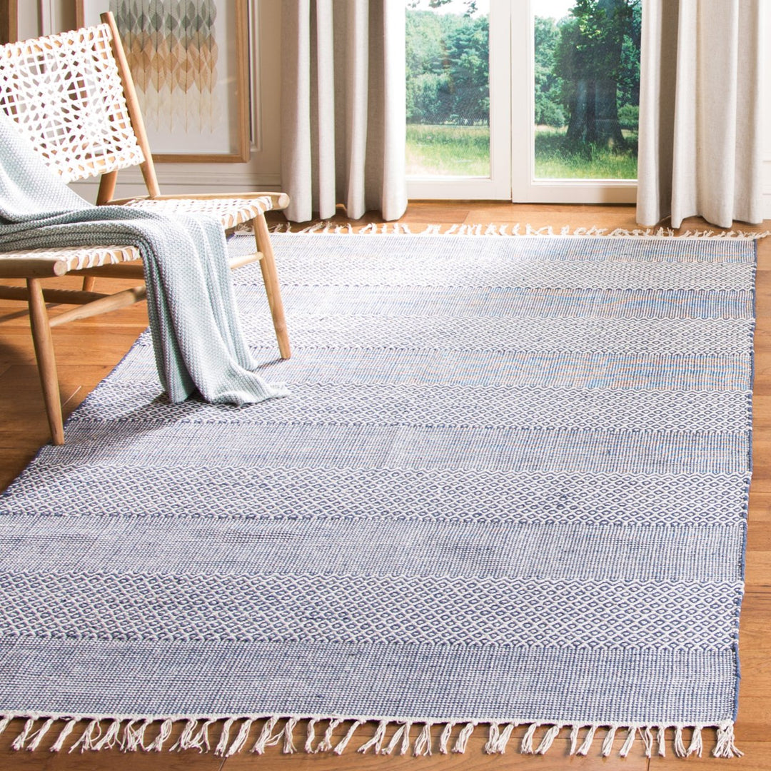 SAFAVIEH Montauk MTK330B Handwoven Ivory / Navy Rug Image 1