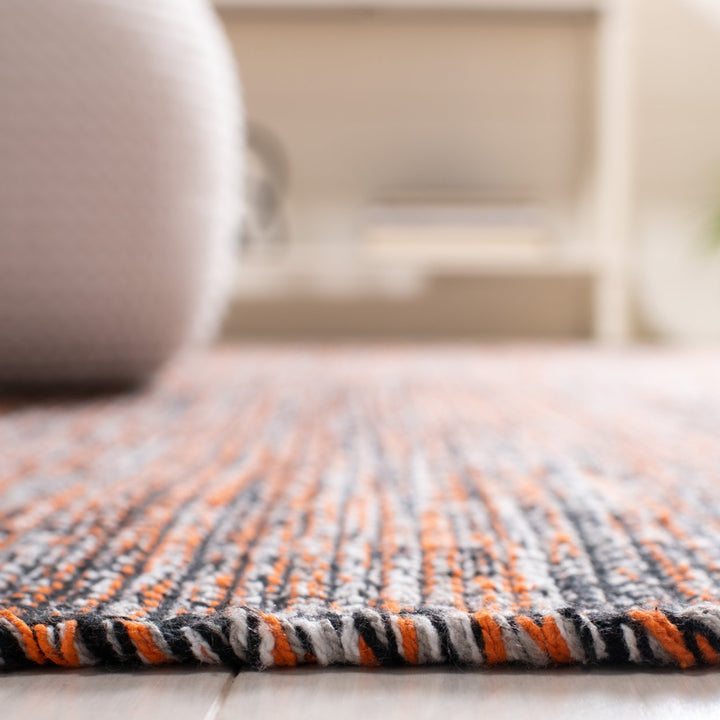 SAFAVIEH Montauk MTK620P Handwoven Orange / Black Rug Image 8