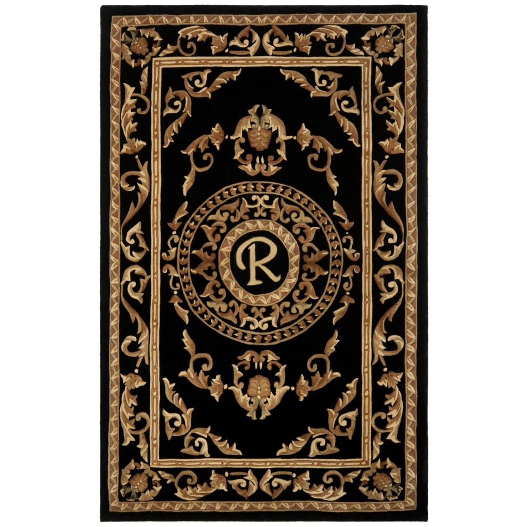 SAFAVIEH Naples Collection NA516R Handmade Black Rug Image 1