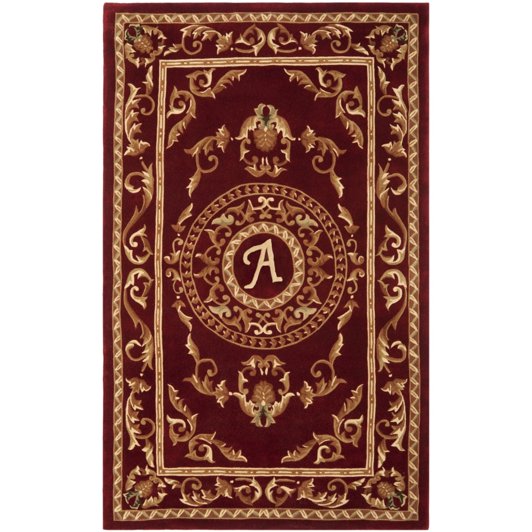 SAFAVIEH Naples Collection NA519A Handmade Burgundy Rug Image 1