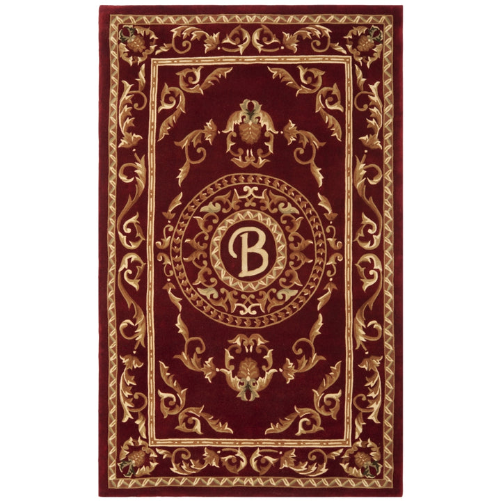 SAFAVIEH Naples Collection NA519B Handmade Burgundy Rug Image 1