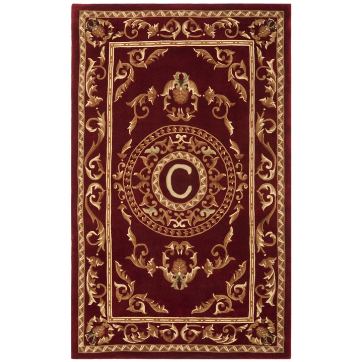 SAFAVIEH Naples Collection NA519C Handmade Burgundy Rug Image 1