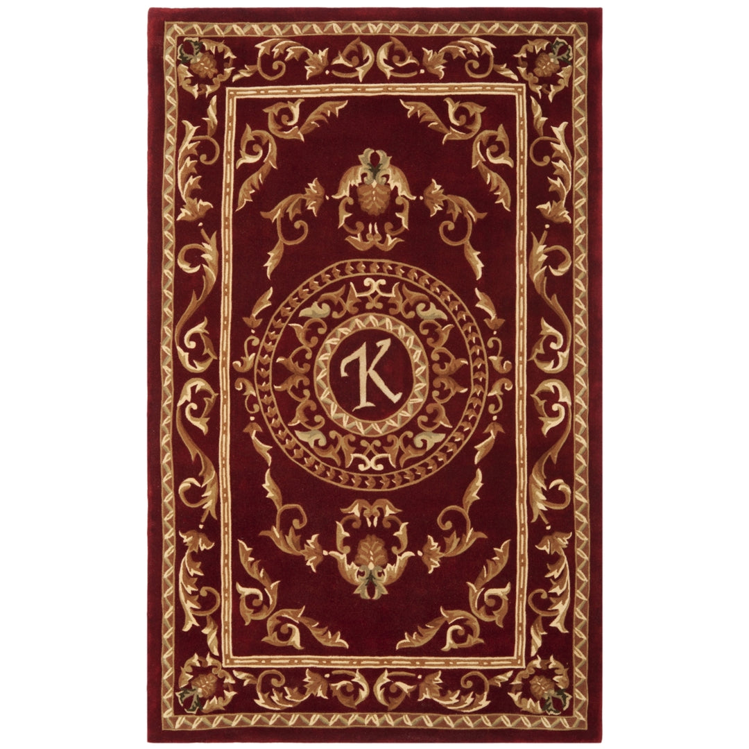 SAFAVIEH Naples Collection NA519K Handmade Burgundy Rug Image 1