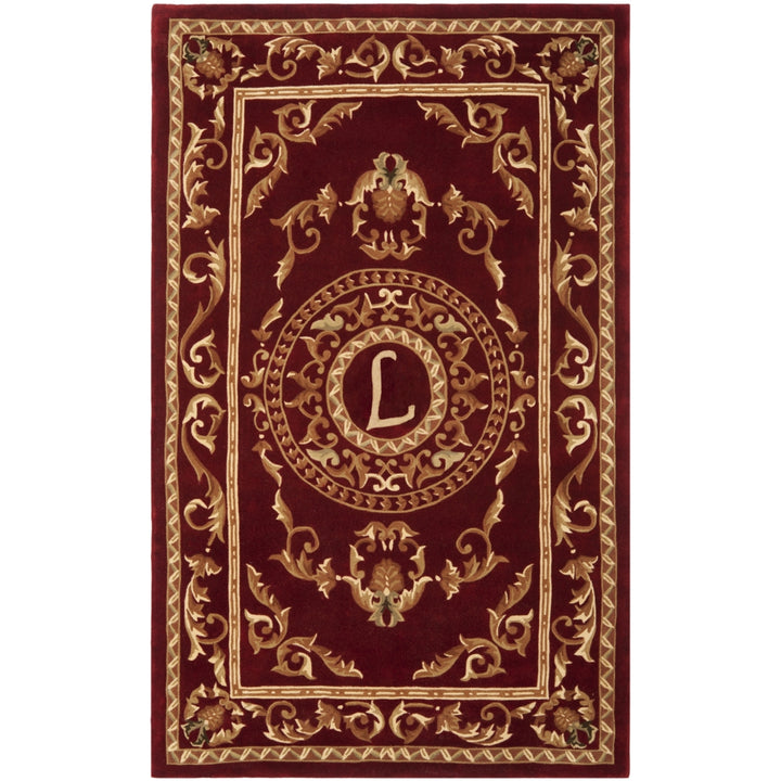 SAFAVIEH Naples Collection NA519L Handmade Burgundy Rug Image 1