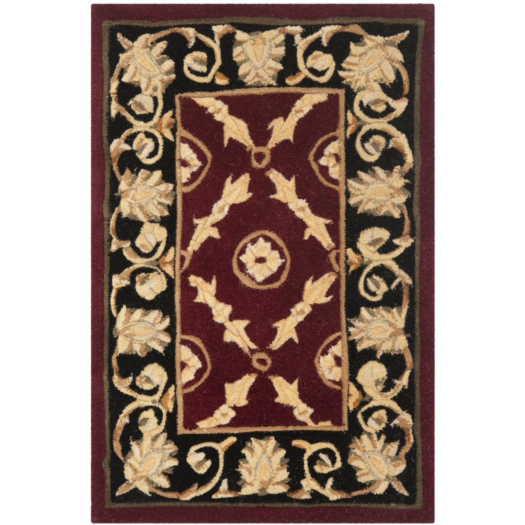 SAFAVIEH Naples NA521B Handmade Burgundy / Black Rug Image 1