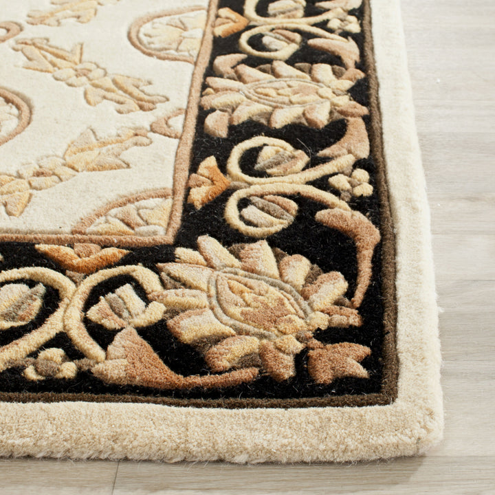 SAFAVIEH Naples NA521A Handmade Ivory / Black Rug Image 5