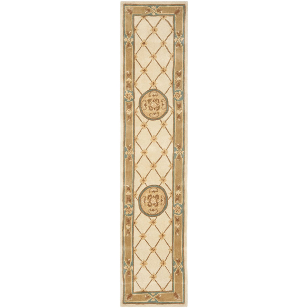 SAFAVIEH Naples NA523B Handmade Ivory / Caramel Rug Image 1