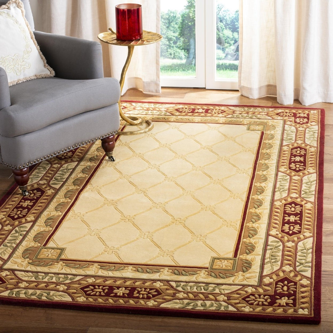 SAFAVIEH Naples Collection NA708A Handmade Assorted Rug Image 1