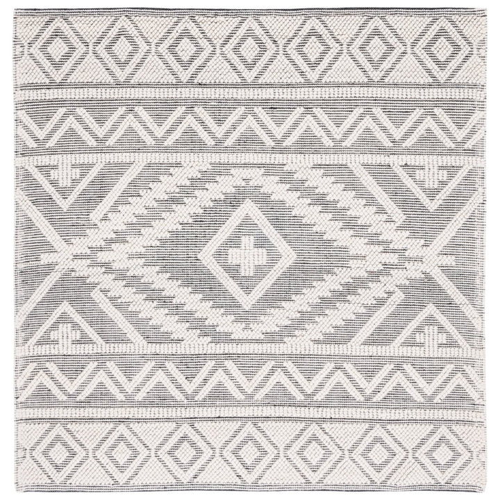 SAFAVIEH Natura NAT275Z Handwoven Black / Ivory Rug Image 1