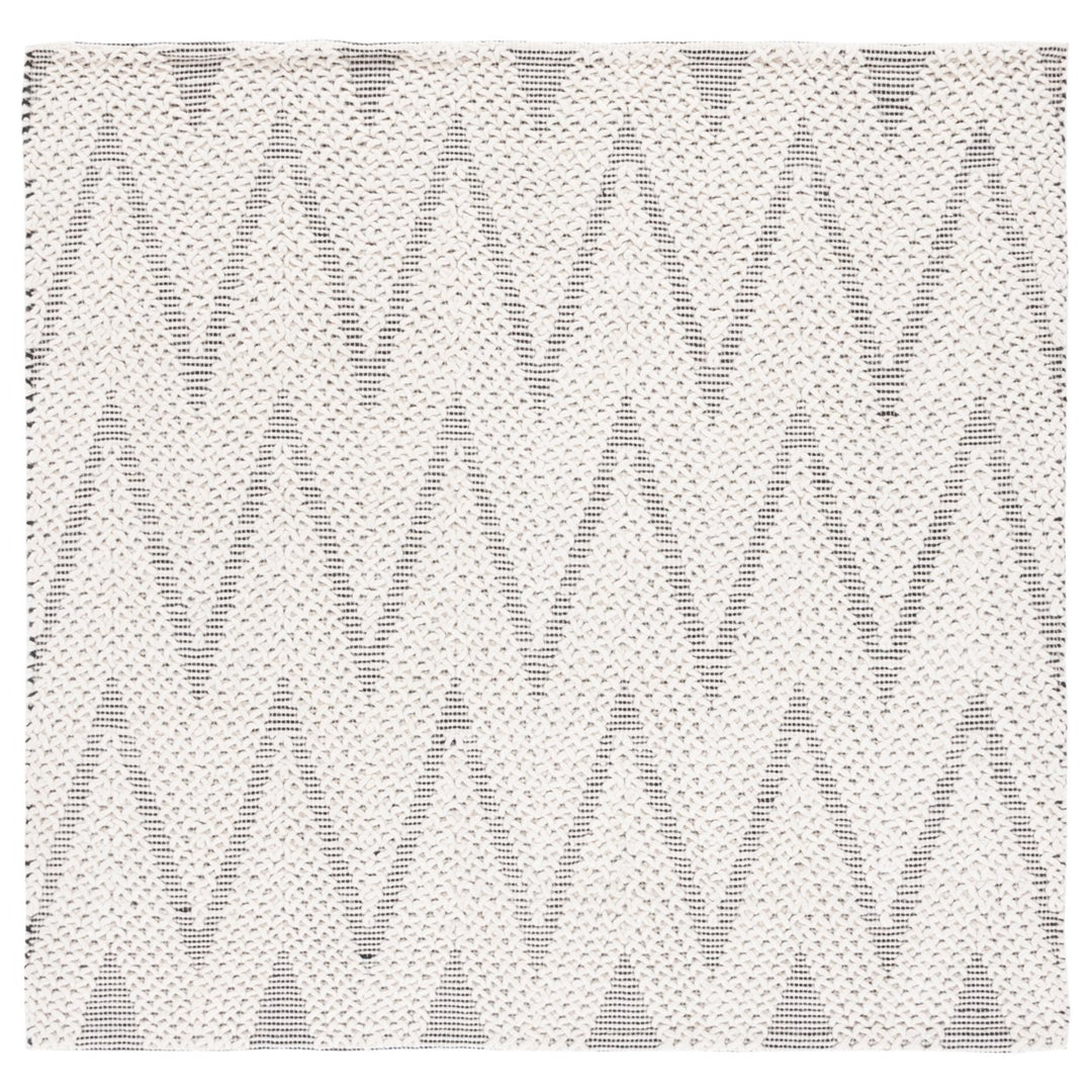 SAFAVIEH Natura NAT279A Handwoven Ivory / Black Rug Image 1