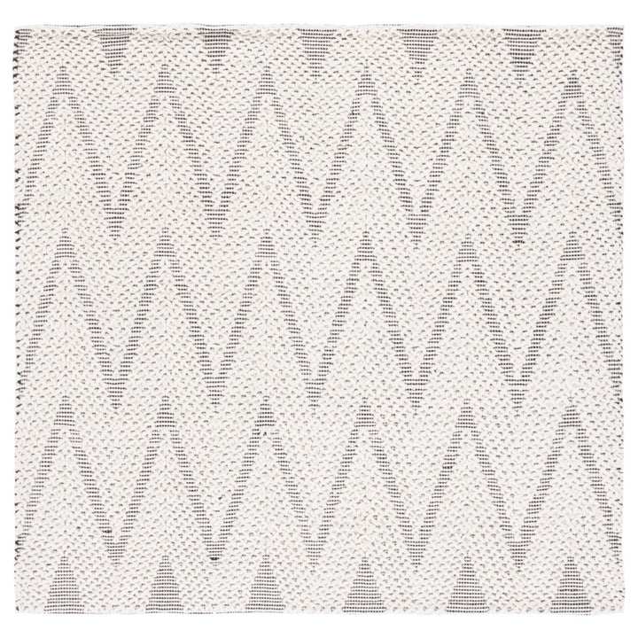 SAFAVIEH Natura NAT279A Handwoven Ivory / Black Rug Image 1