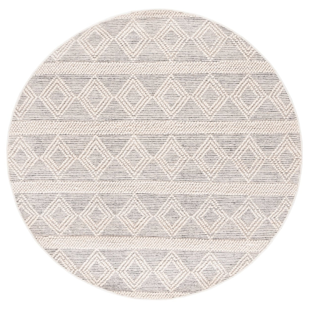 SAFAVIEH Natura NAT307A Handwoven Ivory / Black Rug Image 1