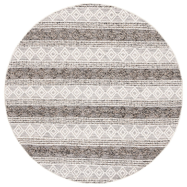 SAFAVIEH Natura NAT336A Handwoven Ivory / Black Rug Image 1