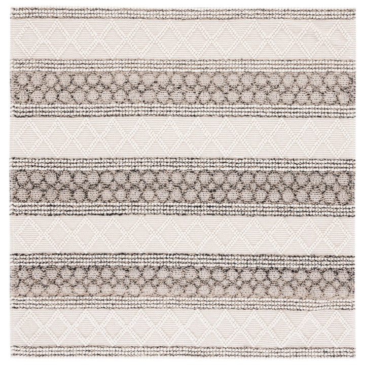 SAFAVIEH Natura NAT340A Handwoven Ivory / Black Rug Image 1