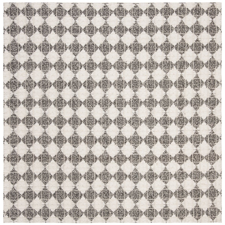 SAFAVIEH Natura NAT407Z Handwoven Black / Ivory Rug Image 1