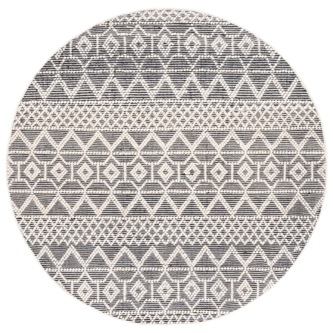 SAFAVIEH Natura NAT341A Handwoven Ivory / Black Rug Image 1