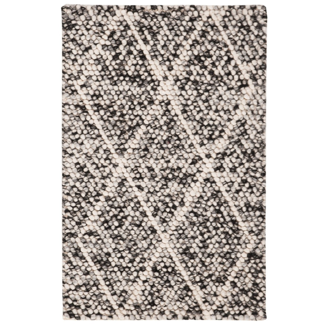 SAFAVIEH Natura NAT712C Handwoven Ivory / Black Rug Image 1