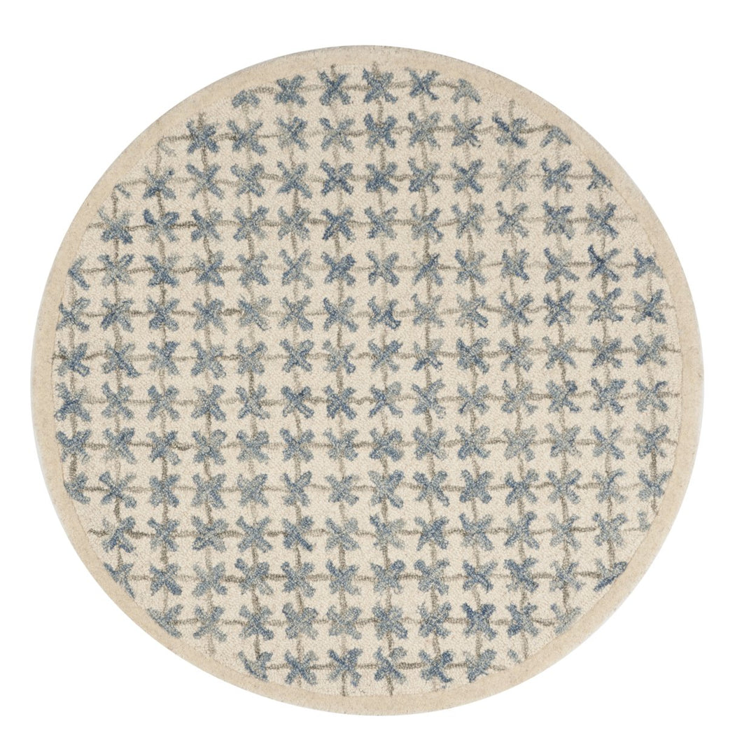 SAFAVIEH Novelty NOV106A Handmade Ivory / Blue Rug Image 1