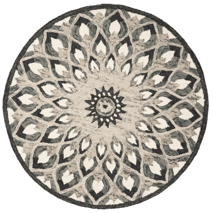 SAFAVIEH Novelty NOV603H Handmade Charcoal / Ivory Rug Image 1