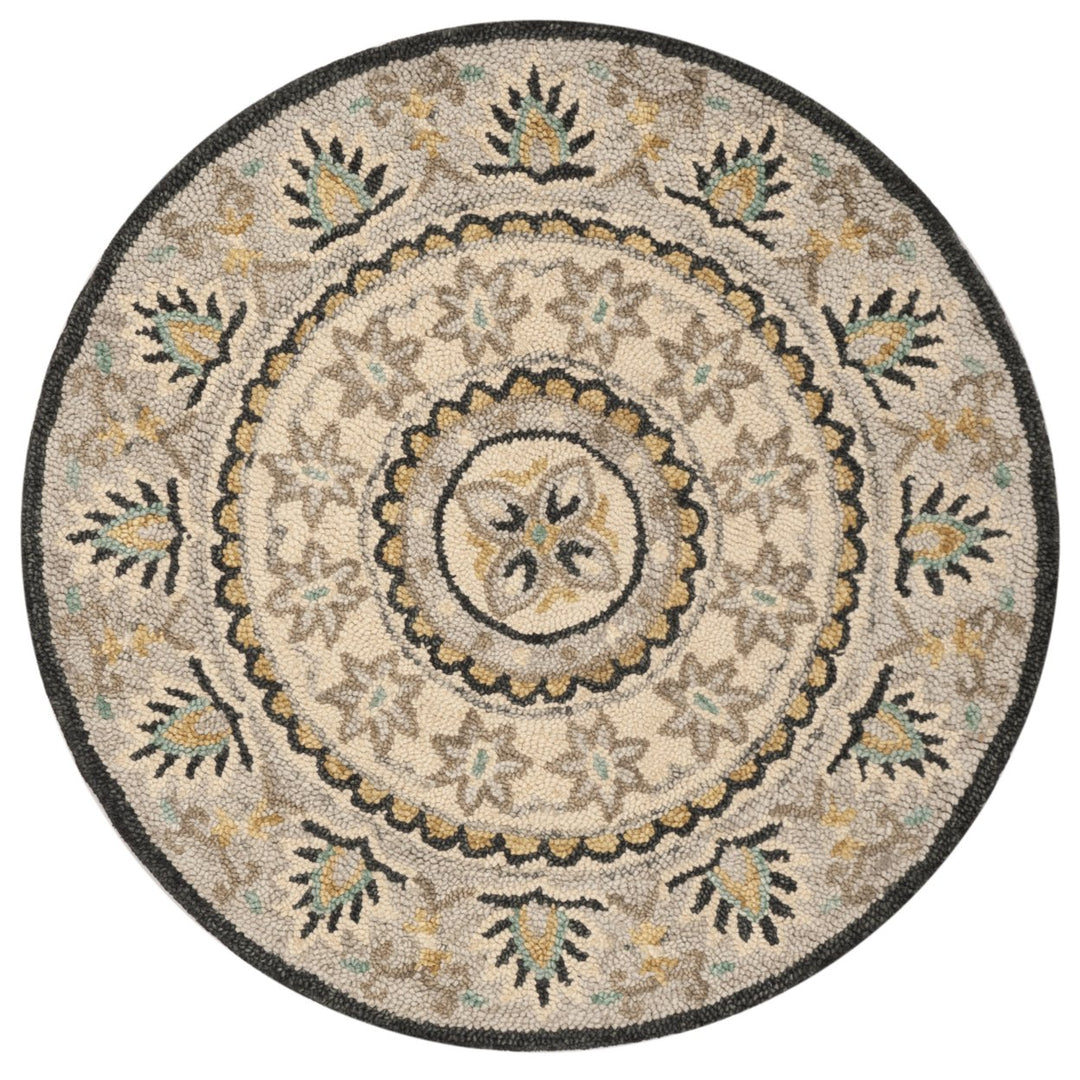 SAFAVIEH Novelty NOV606F Handmade Ivory / Grey Rug Image 1