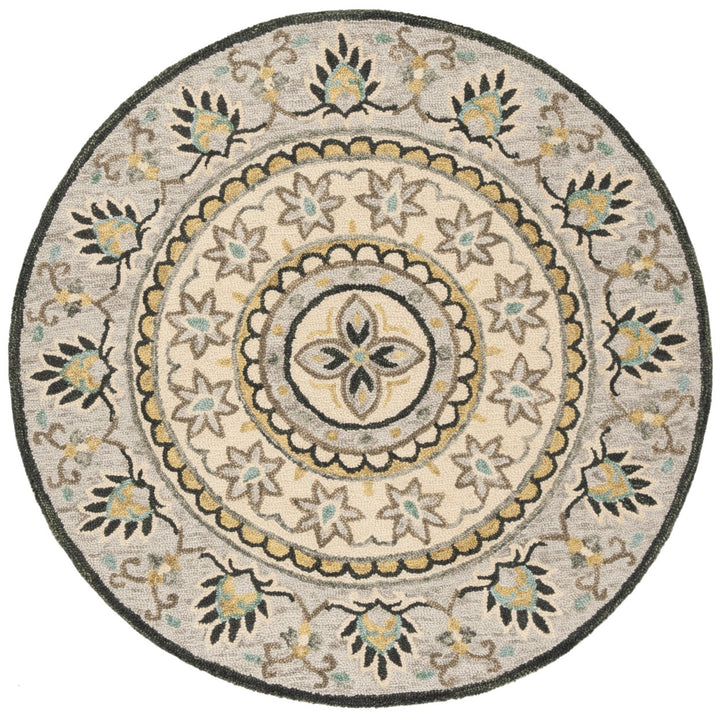 SAFAVIEH Novelty NOV606F Handmade Ivory / Grey Rug Image 1