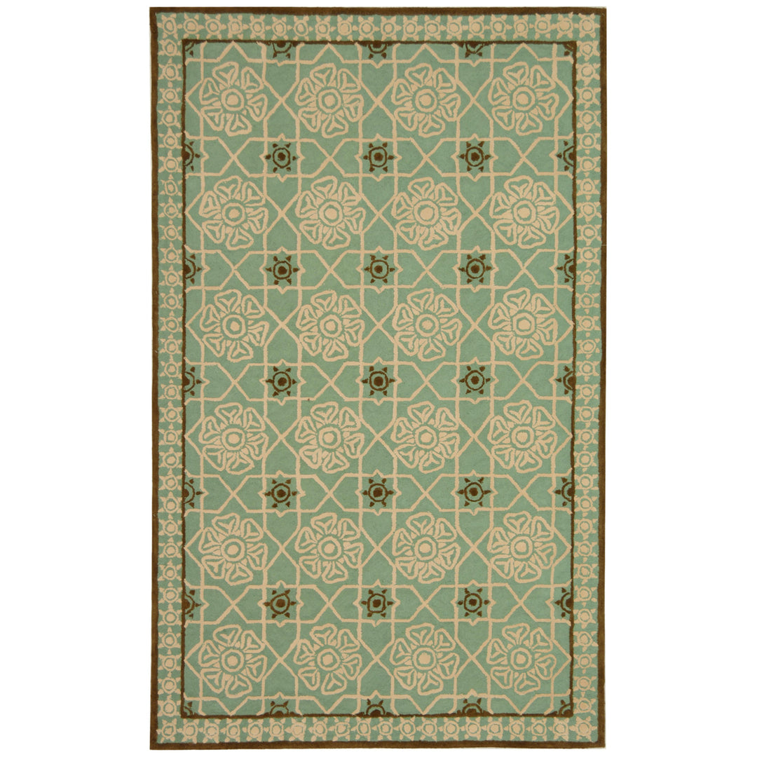 SAFAVIEH Newport NPT423B Hand-hooked Teal / Ivory Rug Image 1