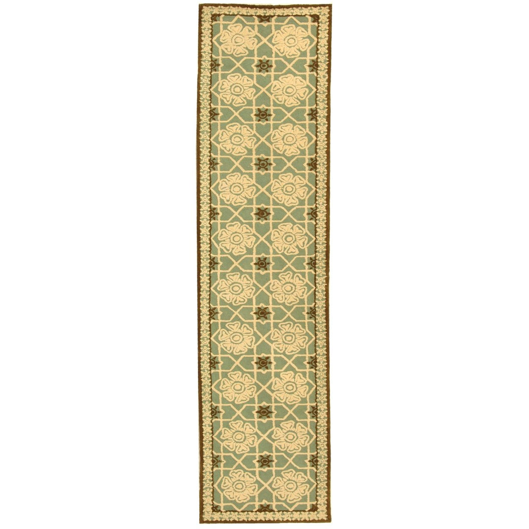 SAFAVIEH Newport NPT423B Hand-hooked Teal / Ivory Rug Image 1