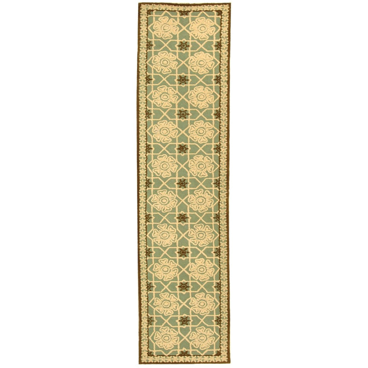 SAFAVIEH Newport NPT423B Hand-hooked Teal / Ivory Rug Image 1