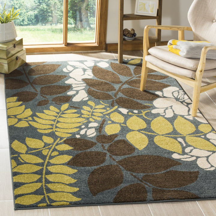 SAFAVIEH Newbury Collection NWB8698-6525 Blue / Brown Rug Image 1