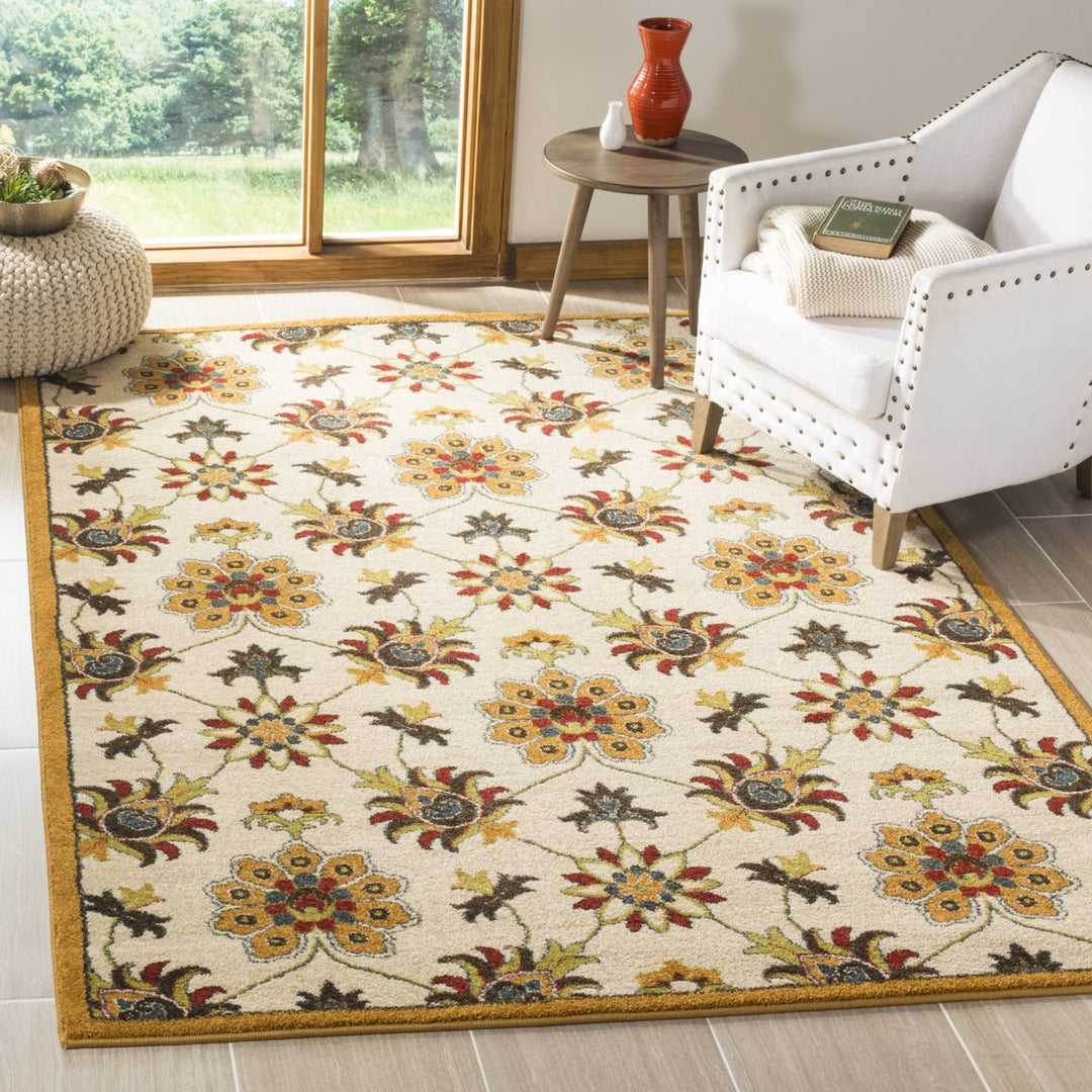 SAFAVIEH Newbury Collection NWB8704-1220 Ivory / Gold Rug Image 1