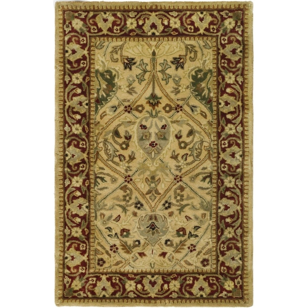 SAFAVIEH Persian Legend PL819D Handmade Ivory / Rust Rug Image 1