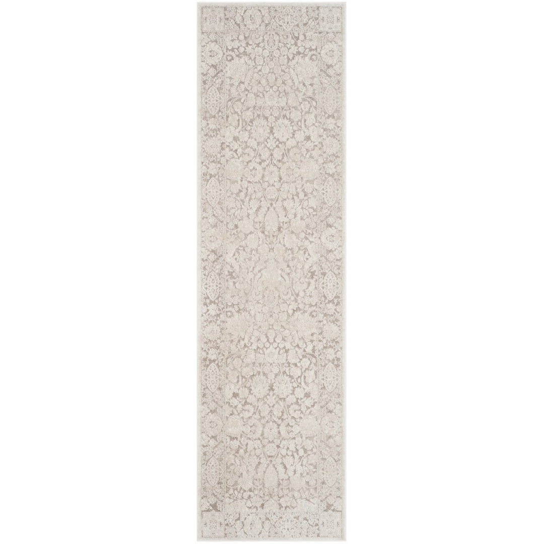 SAFAVIEH Reflection Collection RFT667A Beige / Cream Rug Image 1