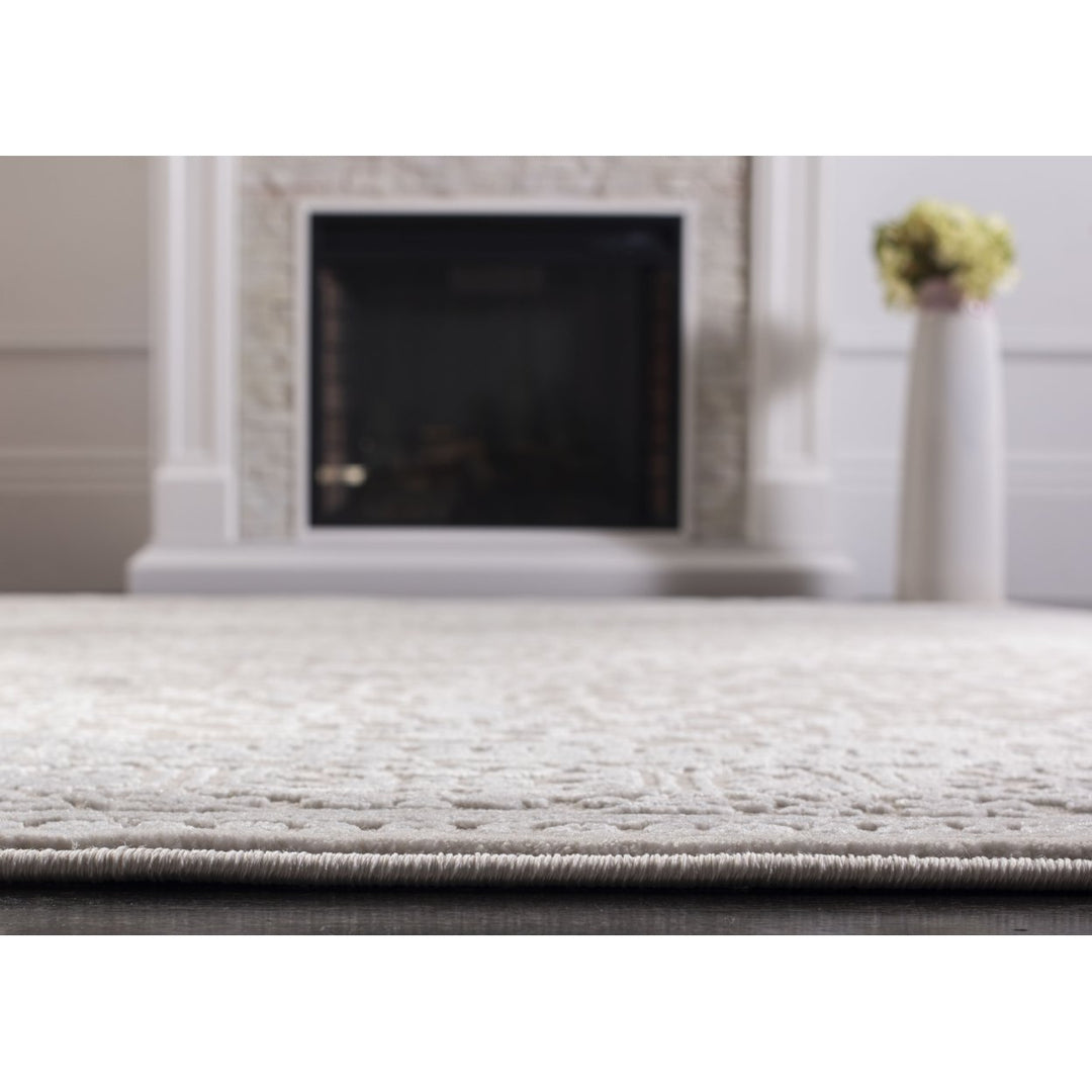 SAFAVIEH Reflection Collection RFT670D Creme / Ivory Rug Image 7