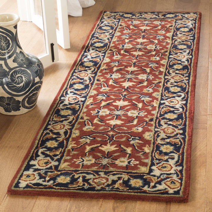 SAFAVIEH Royalty ROY256A Handmade Rust / Navy Rug Image 3