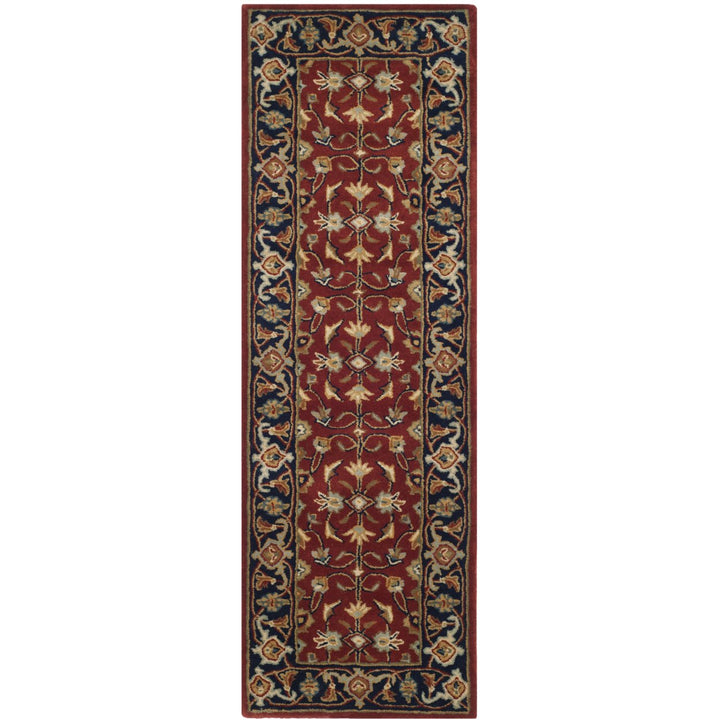 SAFAVIEH Royalty ROY256A Handmade Rust / Navy Rug Image 1