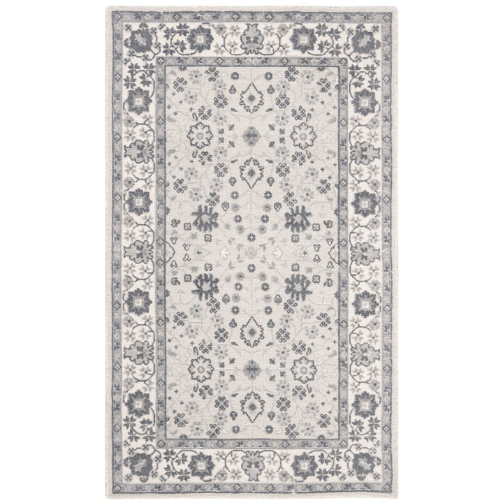 SAFAVIEH Restoration Vintage RVT401G Ivory / Silver Rug Image 1