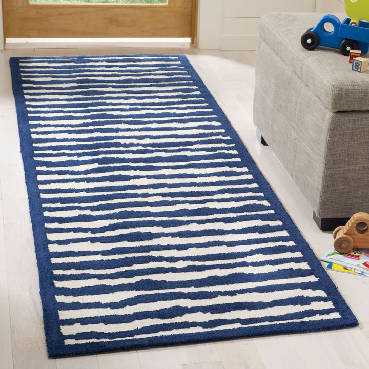 SAFAVIEH Kids Collection SFK215A Handmade Ivory/Blue Rug Image 2