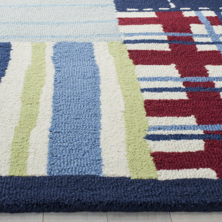 SAFAVIEH Kids Collection SFK318A Handmade Blue/Multi Rug Image 5