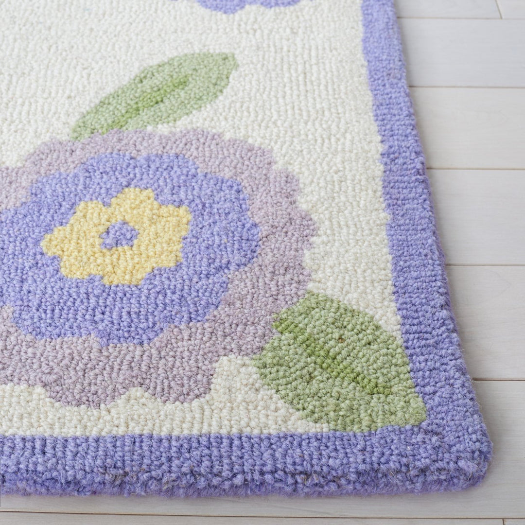 SAFAVIEH Kids SFK355V Handmade Lavender / Ivory Rug Image 2