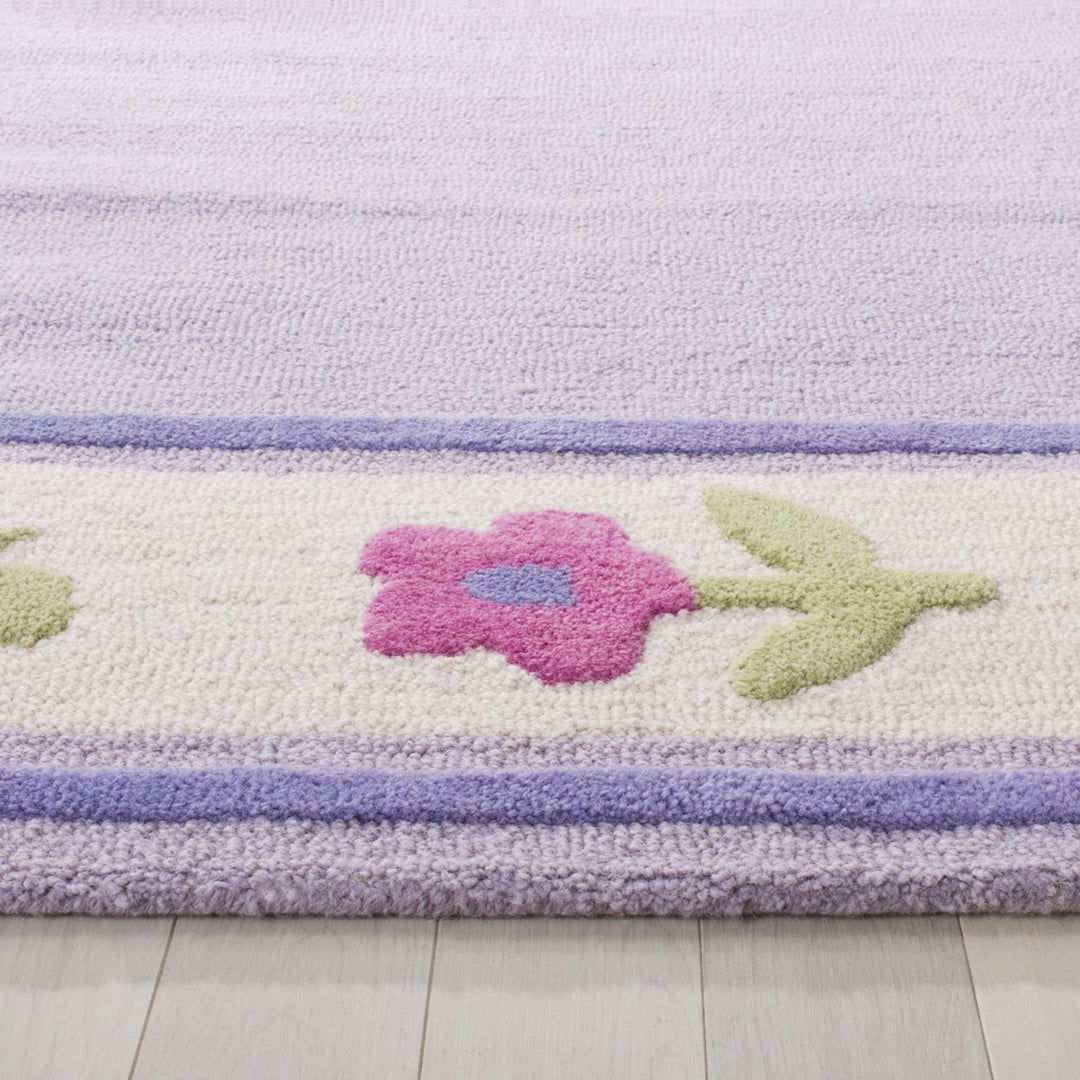 SAFAVIEH Kids SFK354A Handmade Lavender / Multi Rug Image 7